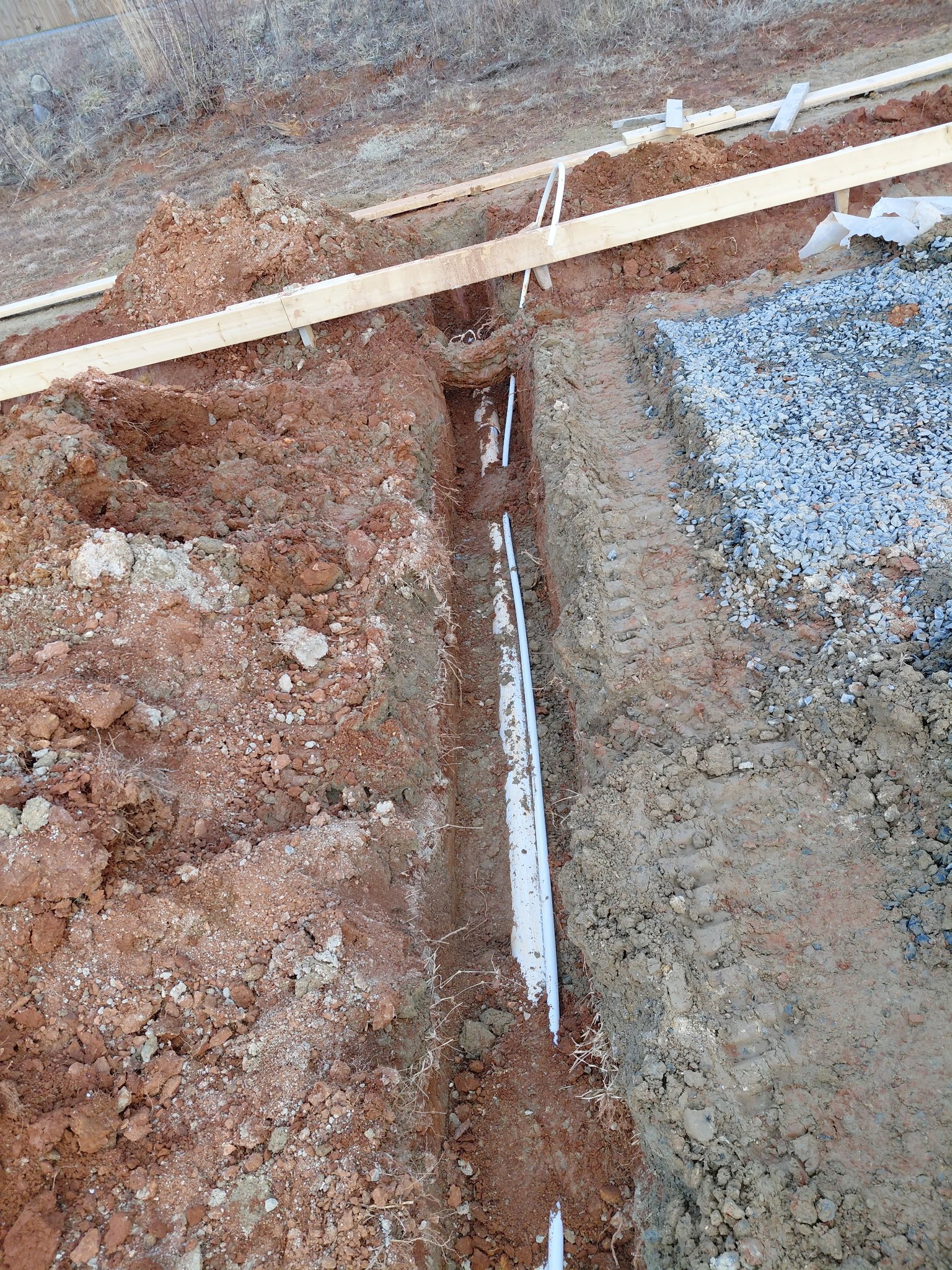 Ext Undground Pipes Trench 1 plumbing work photo by Burcham's Plumbing, licensed plumber Yadkinville NC and Piedmont Triad