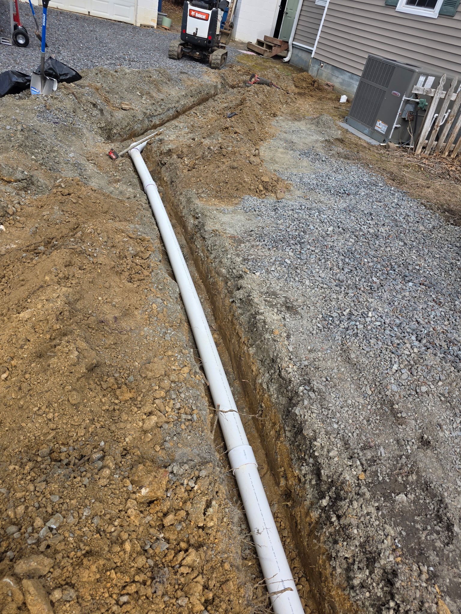Ext Undground Pipes Trench 2 plumbing work photo by Burcham's Plumbing, licensed plumber Yadkinville NC and Piedmont Triad