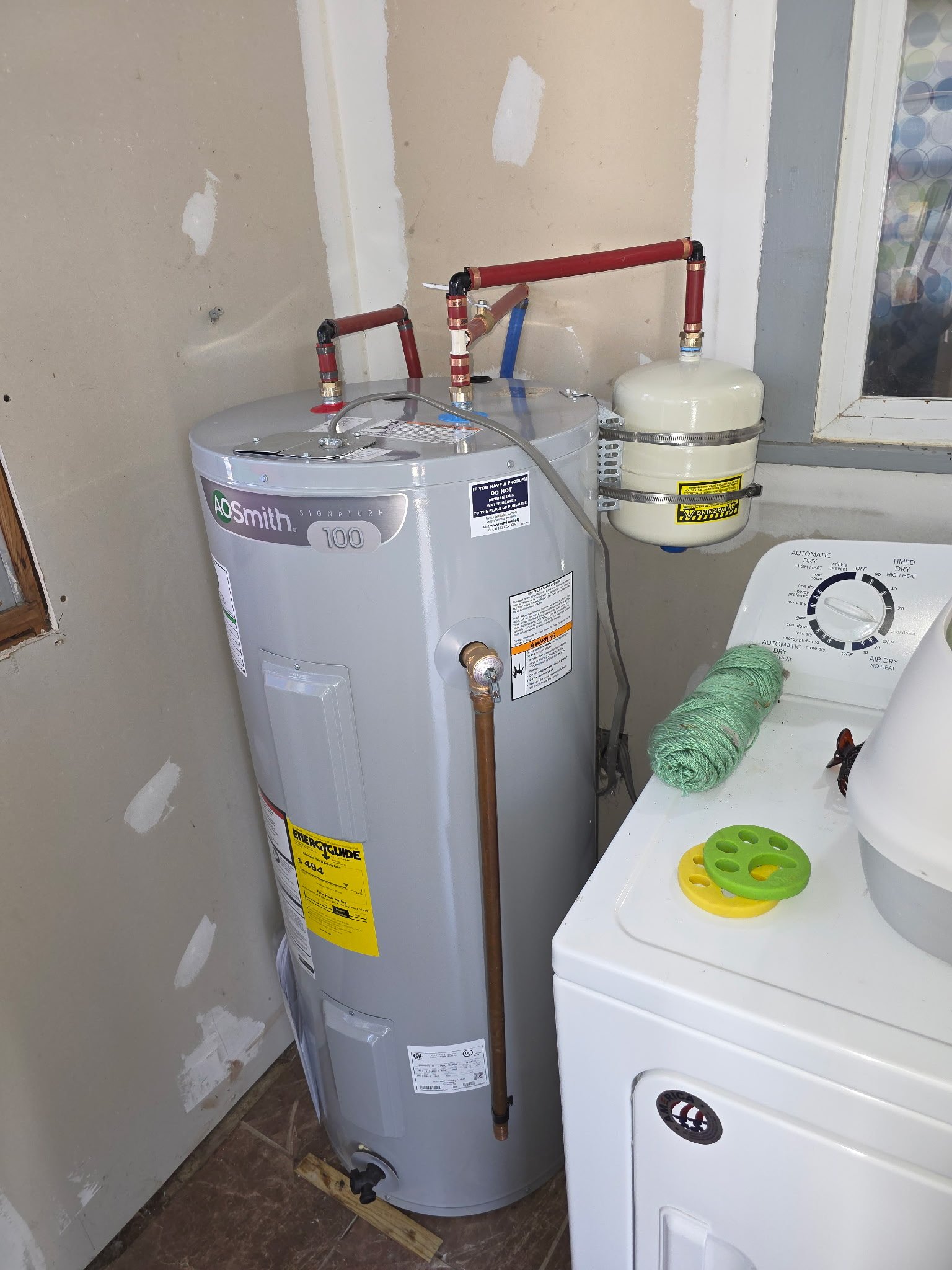 Int Electri Water Heater 4 plumbing work photo by Burcham's Plumbing, licensed plumber Yadkinville NC and Piedmont Triad
