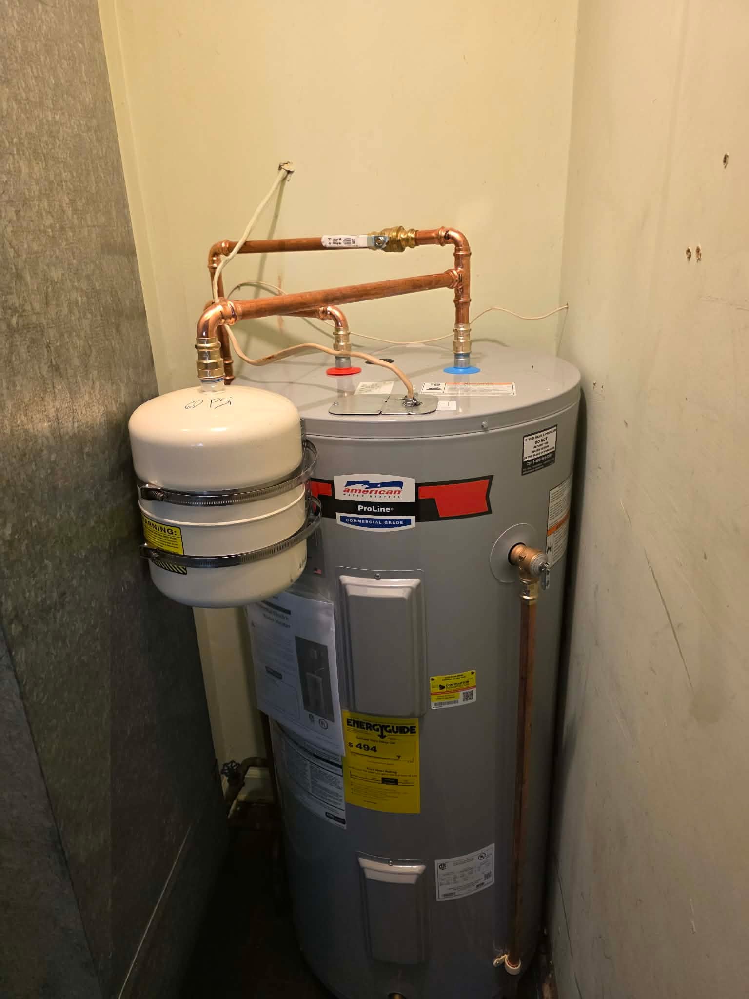 Int Electric Water Heater 1 plumbing work photo by Burcham's Plumbing