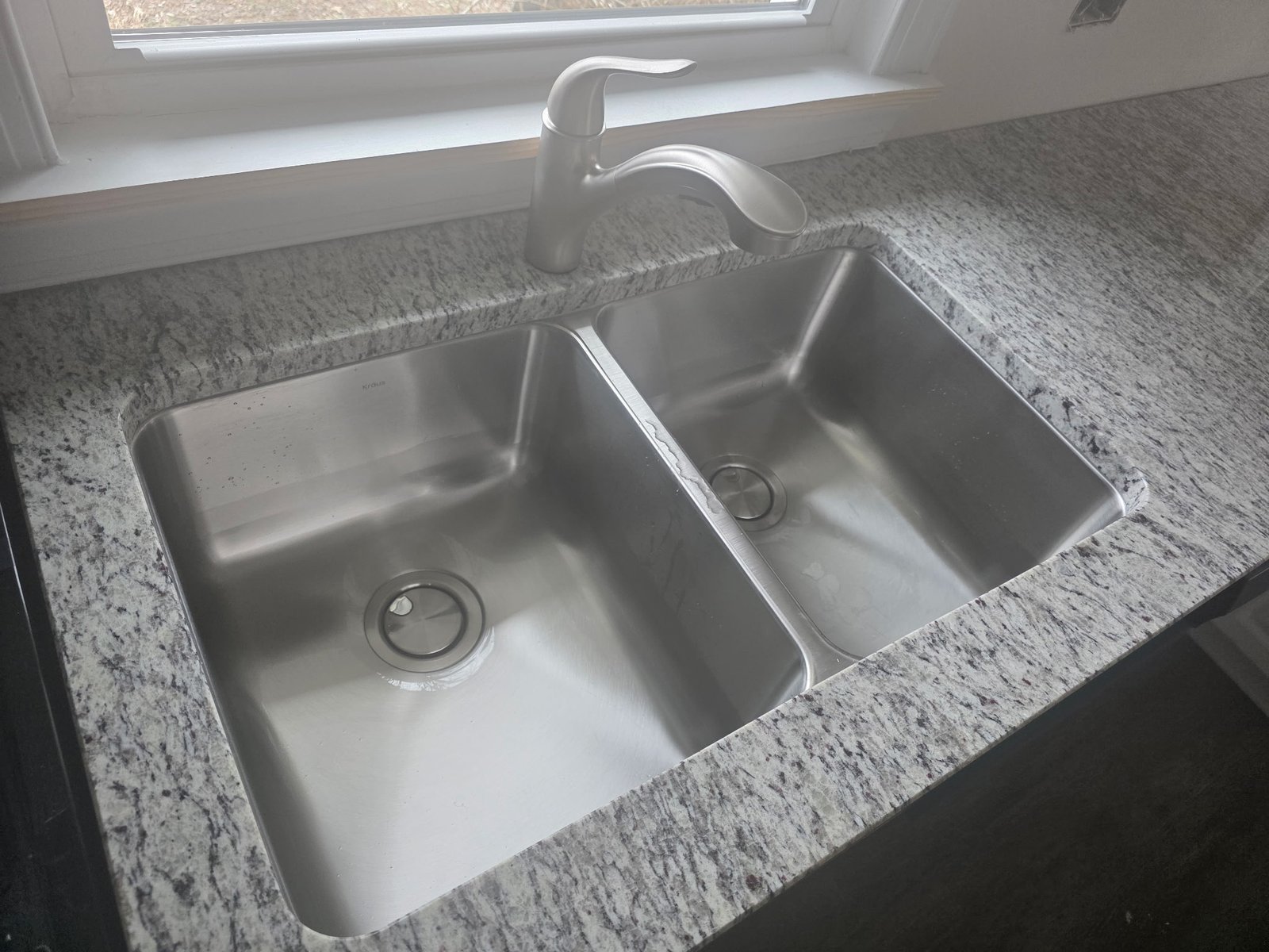Int Residential Kitchen Sink 1 plumbing work photo by Burcham's Plumbing