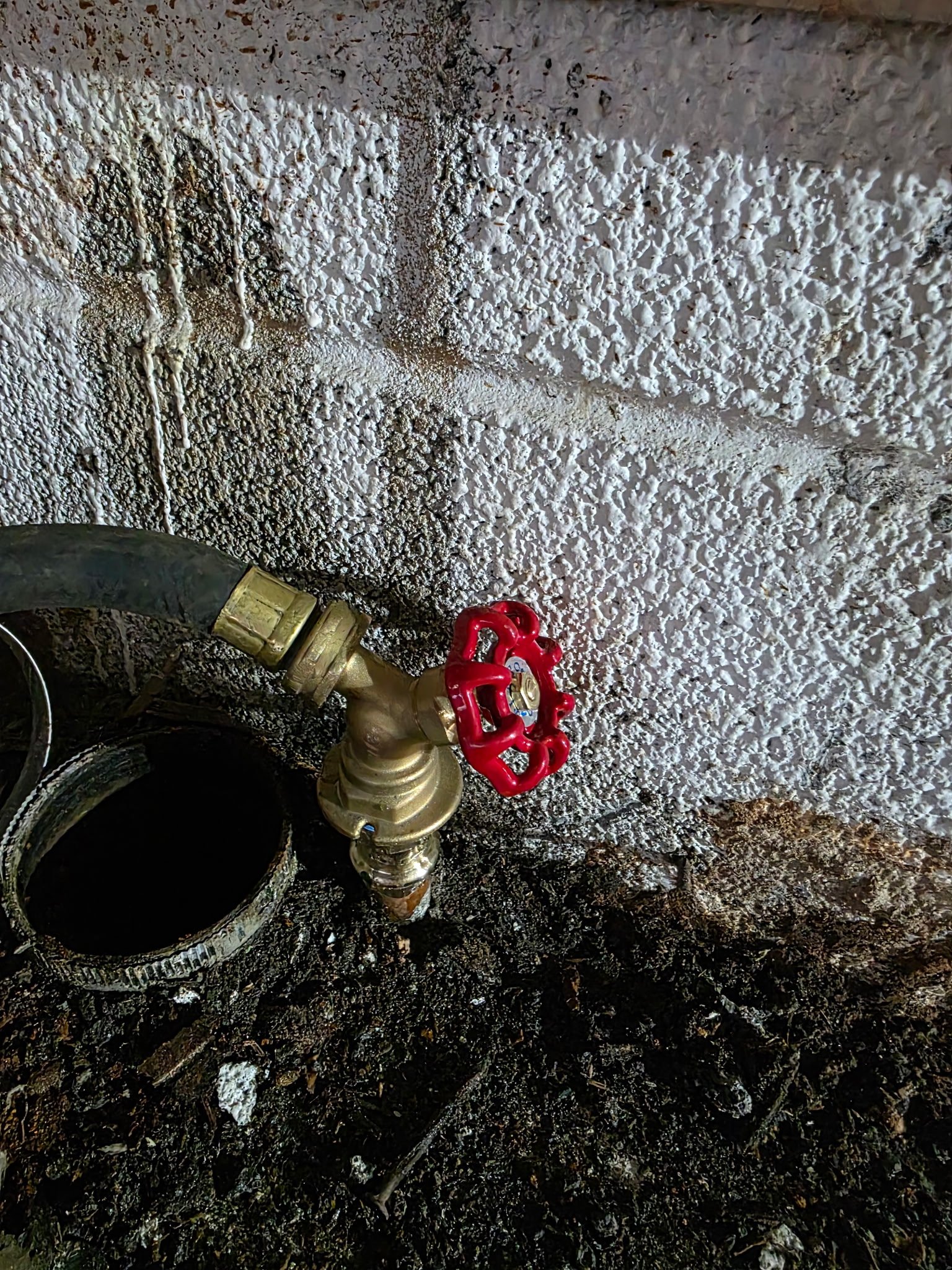Red Water Spigot 1 plumbing work photo by Burcham's Plumbing